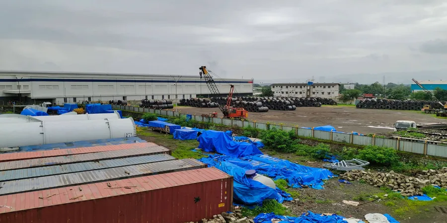 MAAS Infra warehouse with container cargo